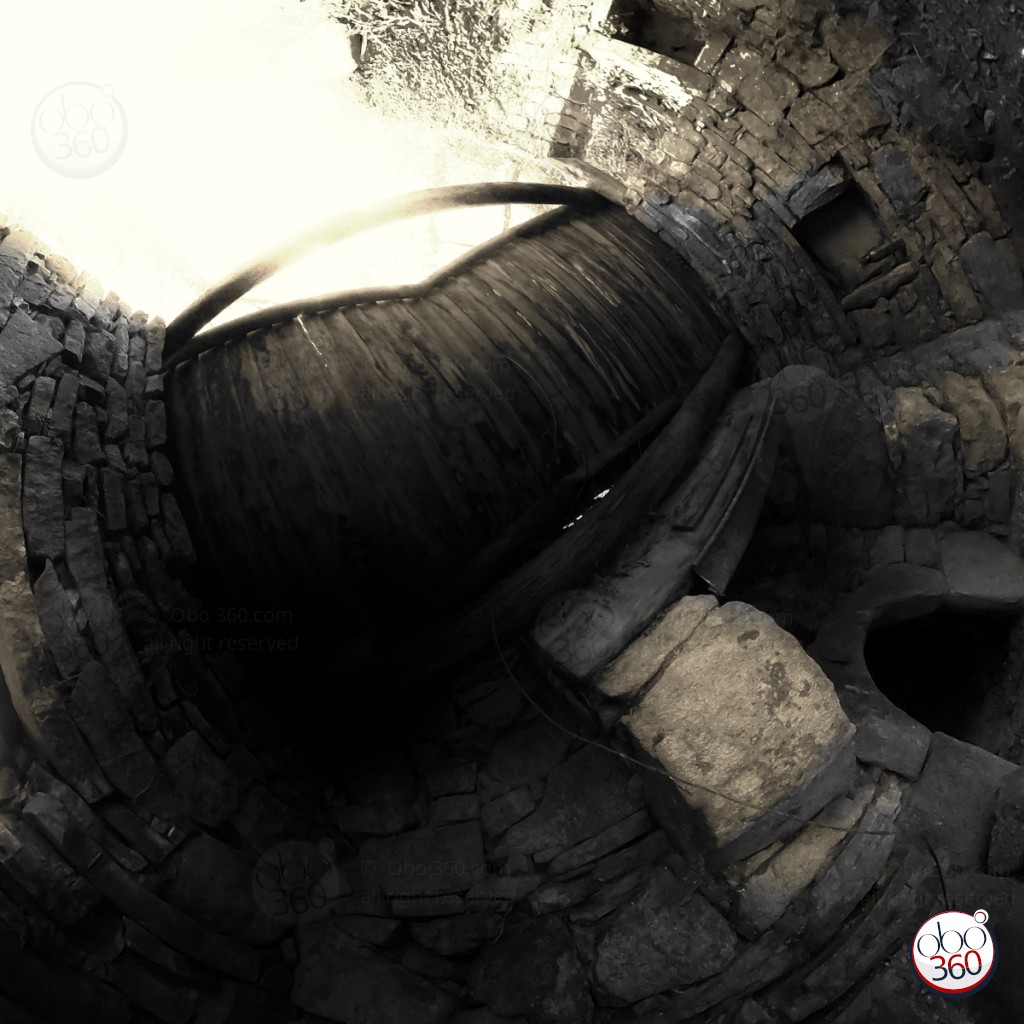 Black and white artistic composition made from a 360° shot.Photo captured in an empty cell of an abandoned castle, somewhere in Brittany.