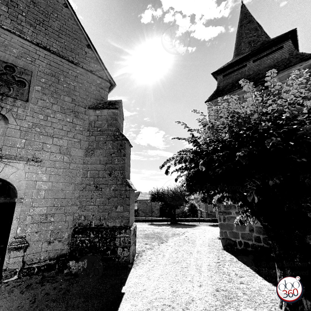 Immersive 360° photo, in black and white, taken at the foot of a church in Creuse, in New Aquitaine.Dive into the photo!